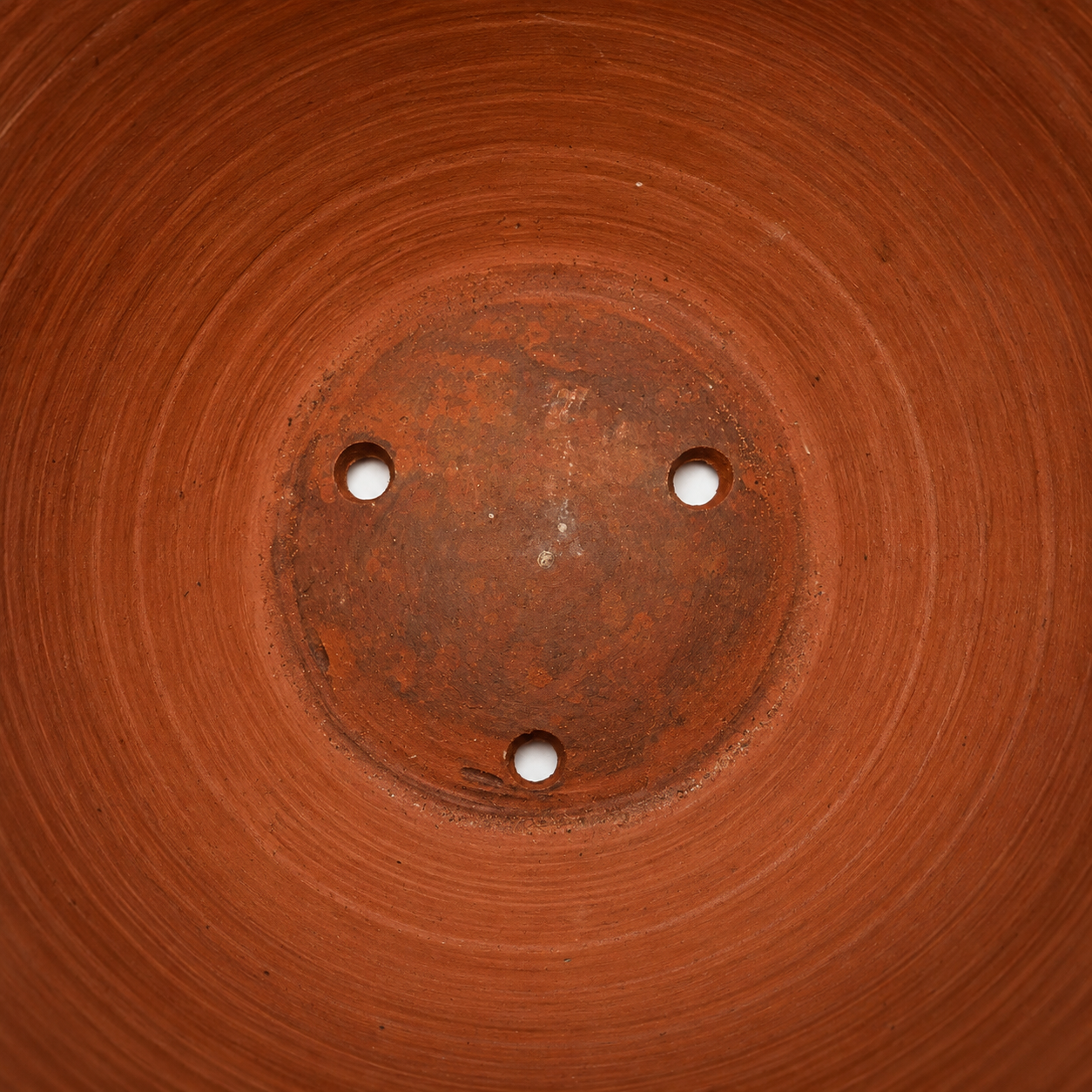 Drainage holes inside the 24 inch Thai ceramic dragon garden pot